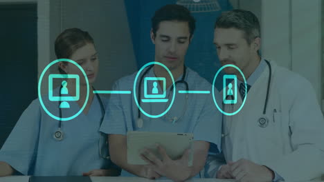 Animation-of-flowchart-of-icons-over-caucasian-doctors-discussing-patient-reports-on-digital-tablet