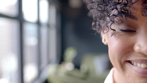 Portrait-of-african-american-business-woman-in-office-with-copy-space