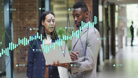 Animation-of-multiple-graphs-with-changing-numbers,-diverse-coworkers-discussing-reports-on-laptop