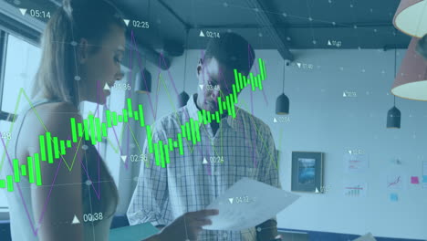 Animation-of-changing-numbers-and-graphs-over-diverse-coworkers-discussing-reports-in-office