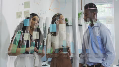 Animation-of-graph-over-diverse-coworkers-discussing-about-strategy-on-glass-wall-in-office