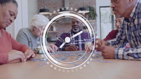 Animation-of-clock-over-diverse-senior-people-doing-puzzles