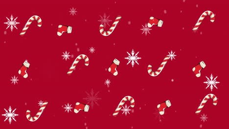 Animation-of-snow-falling-over-christmas-decorations-on-red-background