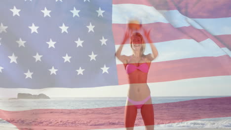 Animation-of-flag-of-usa-over-caucasian-woman-on-beach-in-summer