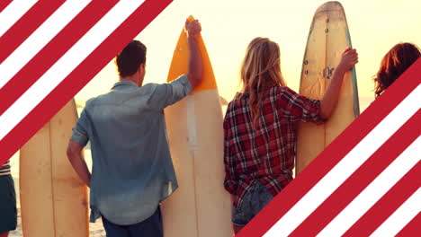 Animation-of-flag-of-usa-over-caucasian-friends-with-surfboards-on-beach-in-summer