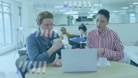 Animation-of-graphs-over-diverse-coworkers-discussing-reports-on-laptop-while-drinking-coffee