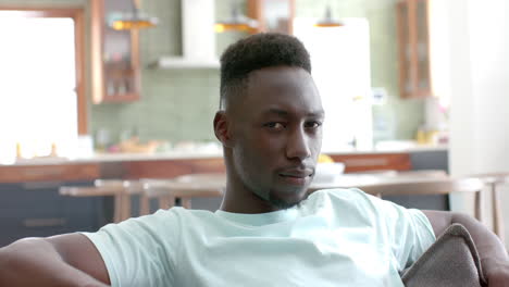 Young-African-American-man-relaxes-at-home