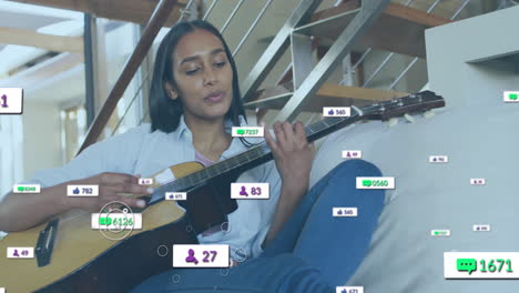 Animación-De-Notificaciones-En-Redes-Sociales-Sobre-Una-Mujer-Birracial-Tocando-La-Guitarra-En-Casa