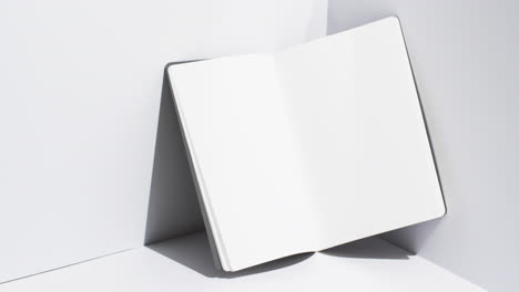 Video-of-book-with-white-blank-pages-and-copy-space-on-white-background