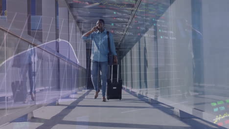 Animation-of-data-processing-over-african-american-man-talking-on-smartphone-at-airport