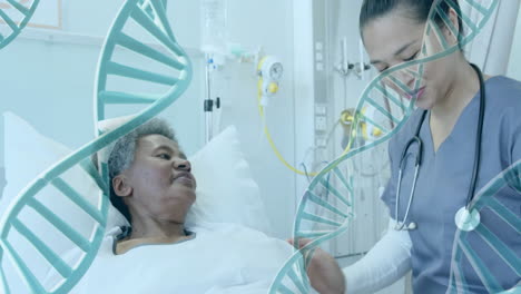 Animation-of-dna-strands-over-diverse-female-doctor-and-patient-in-hospital