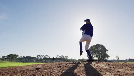 Television-footage-of-two-teams-of-diverse-female-baseball-players-on-baseball-field