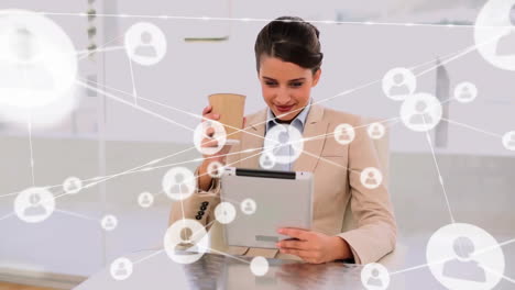 Animation-of-network-of-connections-with-icons-over-caucasian-woman-using-tablet