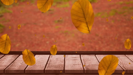 Animación-De-Hojas-De-Otoño-Cayendo-Sobre-Una-Superficie-De-Madera.