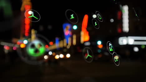 Animation-of-eco-icons-and-data-processing-over-out-of-focus-city-lights