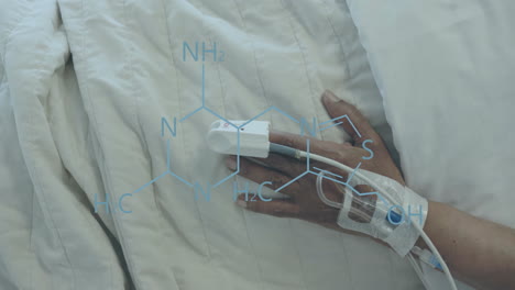 Animation-Eines-Elementdiagramms-über-Der-Hand-Einer-Afroamerikanischen-Patientin-Mit-Infusion-Und-Oximeter