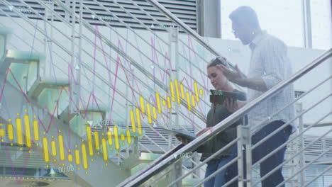 Animation-of-data-processing-over-caucasian-male-and-female-colleague-talking-on-stairs-at-office