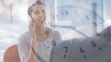 Animation-of-moving-clock-and-sky-with-clouds-over-diverse-colleagues-in-office