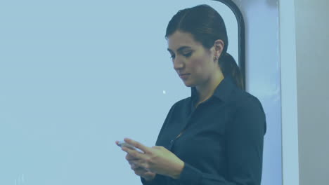 Animation-of-network-of-connections-with-icons-over-biracial-businesswoman-using-smartphone