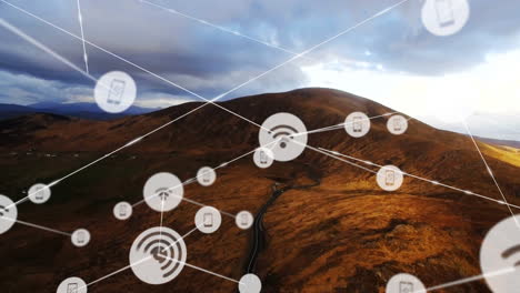 Animation-of-network-of-connections-with-wifi-icons-over-landscape