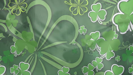 Animation-of-shamrocks-falling-over-white-background