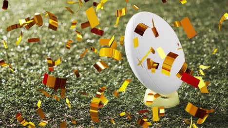 Animation-of-confetti-over-white-rugby-ball-on-grass