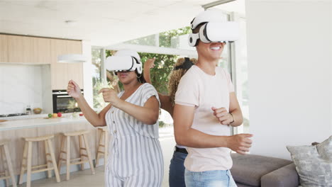 Young-biracial-women-enjoy-virtual-reality-at-home