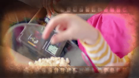 Animación-Del-Fotograma-De-Una-Película-Sobre-La-Sección-Media-De-Diversas-Adolescentes-Usando-Una-Tableta-Comiendo-Palomitas-De-Maíz-En-Casa