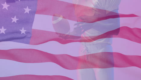 Animation-of-african-american-american-football-player-with-ball-and-flag-of-usa