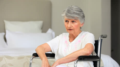 Woman-falling-asleep-in-a-wheelchair