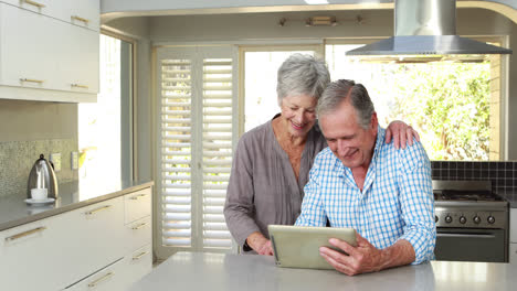 Senior-couple-using-tablet-pc