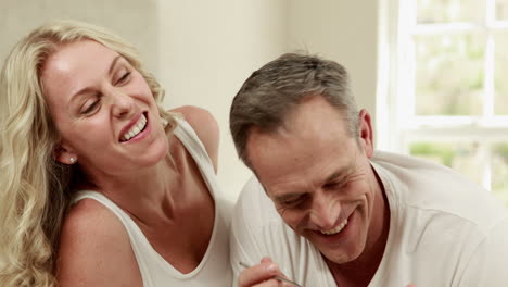 Handsome-man-feeding-his-wife