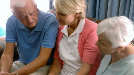 Female-doctor-and-patients-using-digital-tablet