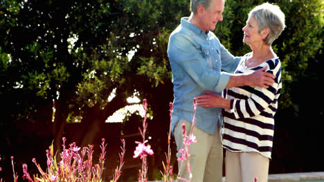 Senior-couple-outside-by-the-pool