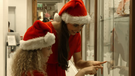 Family-with-Christmas-hat-shopping-