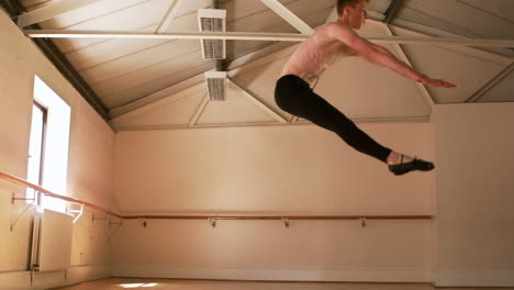 Male-dancer-practicing-a-ballet-dance