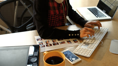 Female-graphic-designer-working-on-computer