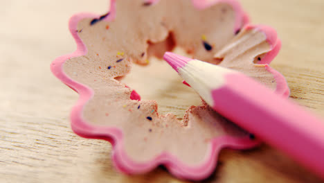 Close-up-of-pink-color-pencil-with-pencil-shaving