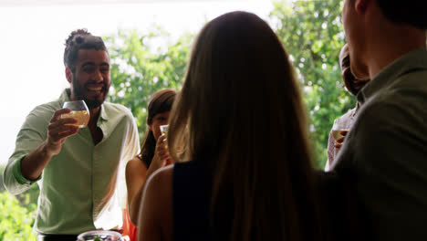 Friends-toasting-at-restaurant