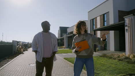 Man-and-woman-walking-around-the-neighbourhood