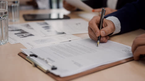 Paperwork-on-the-meeting-table