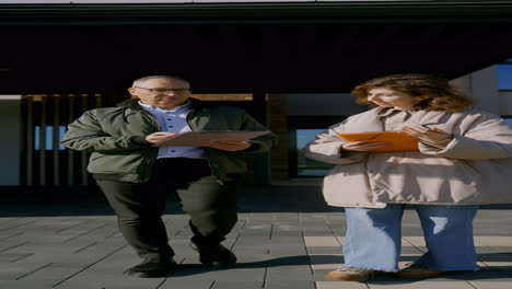 Man-and-woman-walking-around-the-neighbourhood