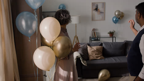 Man-and-woman-decorating-room