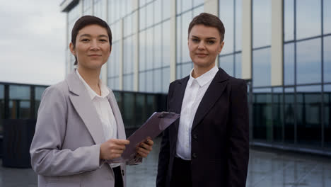 Woman-holding-clipboard