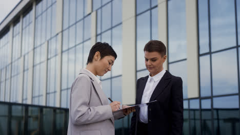 Short-haired-women-outside-the-building