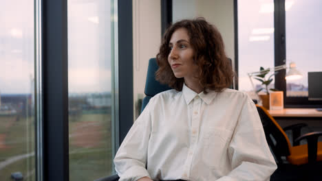 Caucasian-woman-smiling-at-the-office