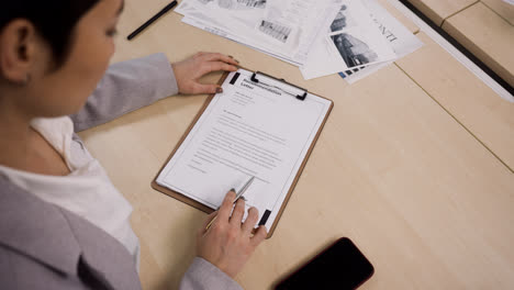 Woman-reading-document