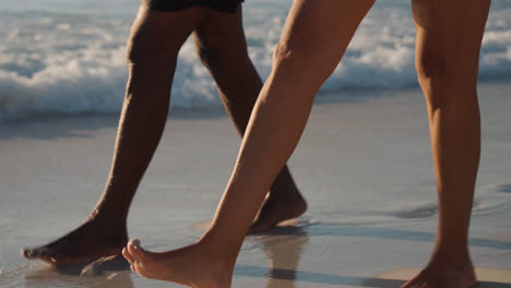 Couple-walking-on-the-seashore