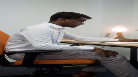 Indian-man-smiling-at-the-office