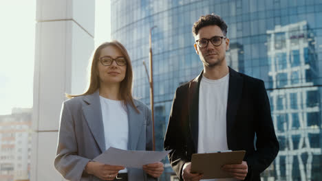 Businesspeople-posing-outdoors